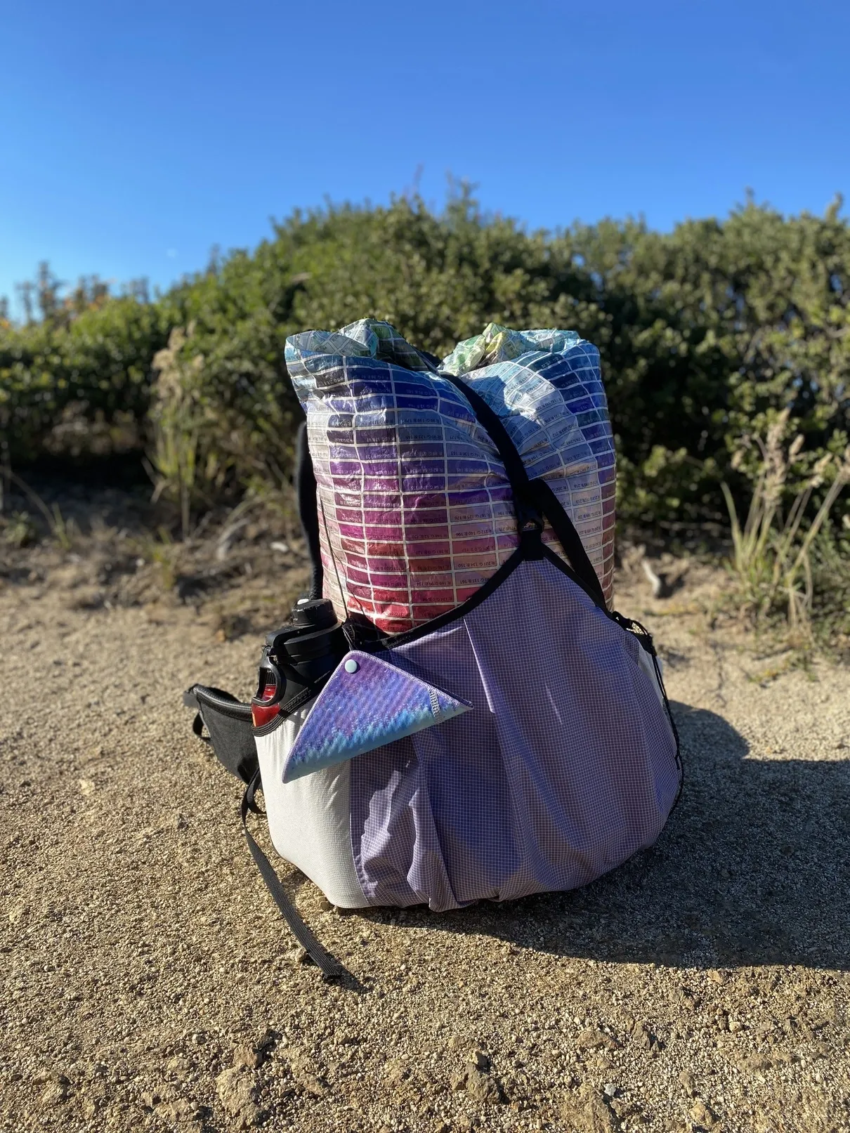'front of multicolored backpack'